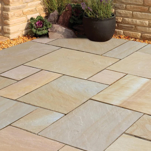 Melton Rippon Buff Riven Installed with decorative aggregate border