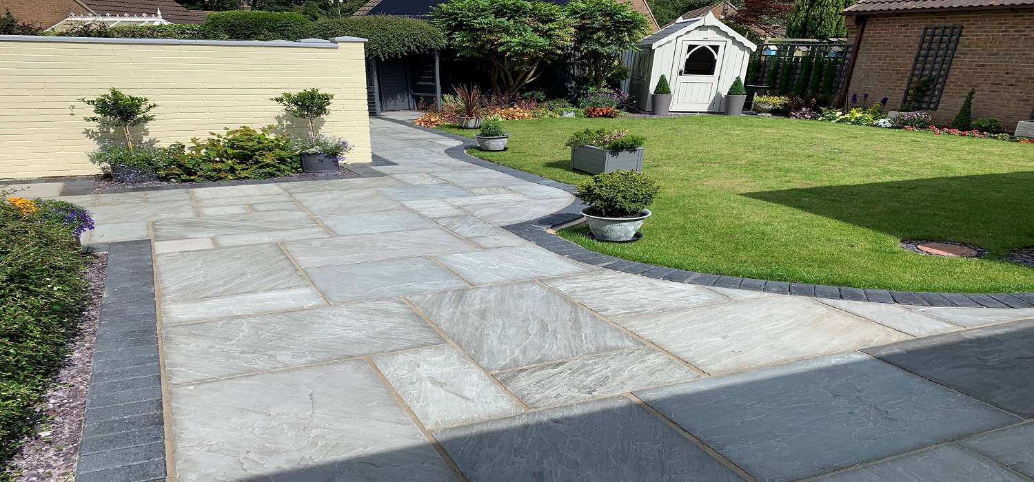 Grey Indian Sandstone patio in modern garden
